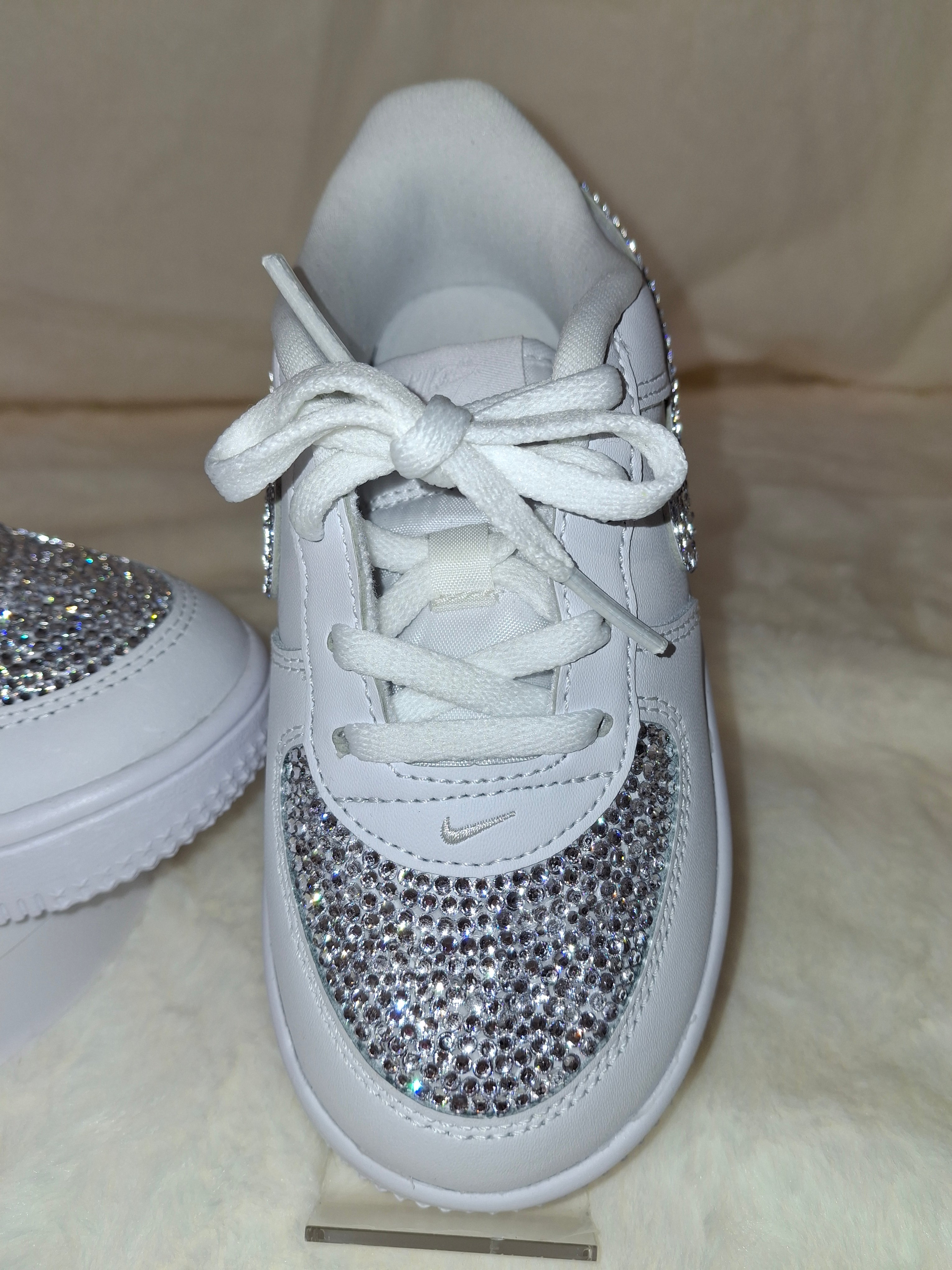 Custom white rhinestone blinged Air Force 1 kids sneakers by Dressed and Done