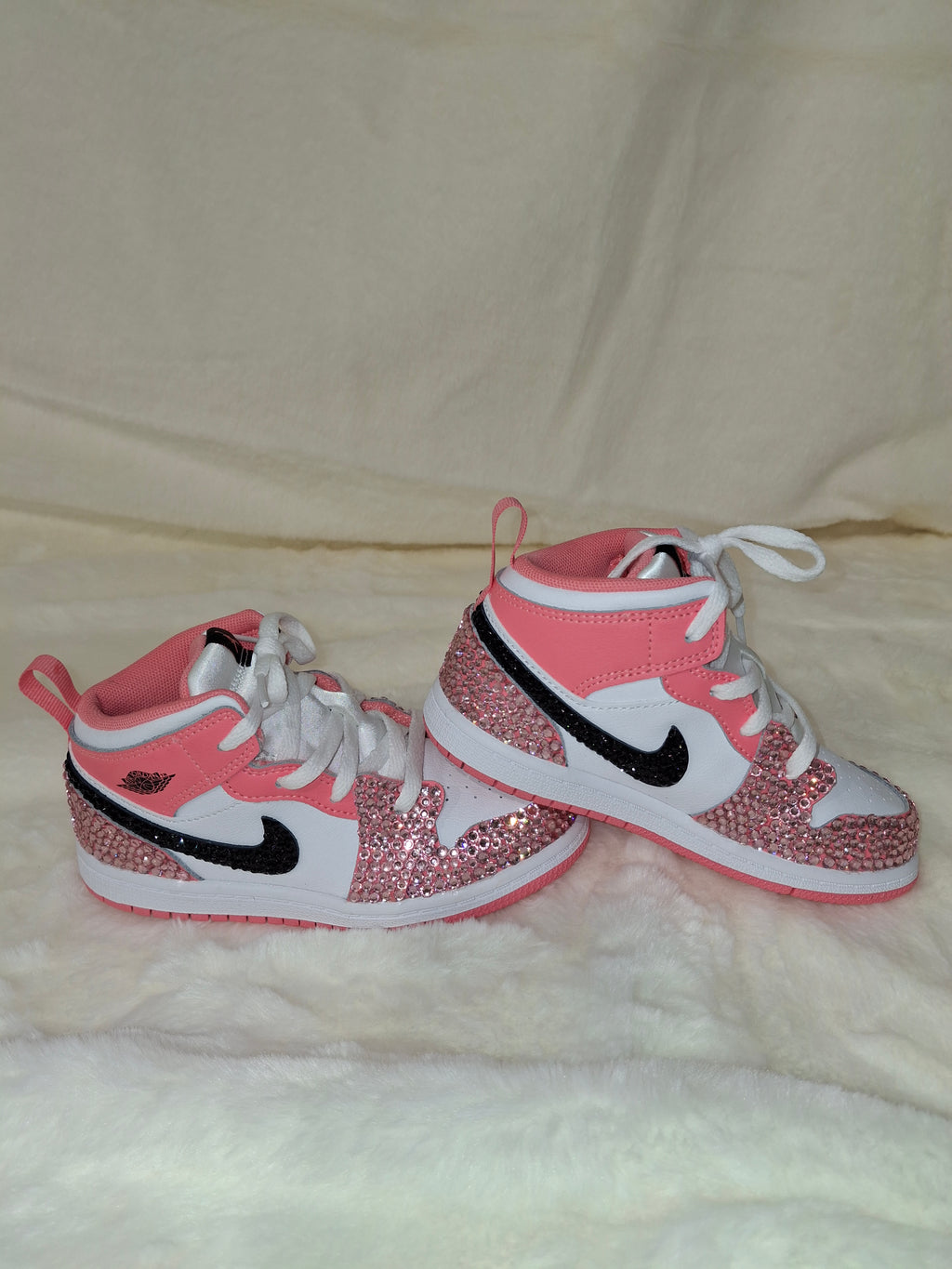 Custom Air Jordan Mid 1 sneaker with black and pink rhinestones