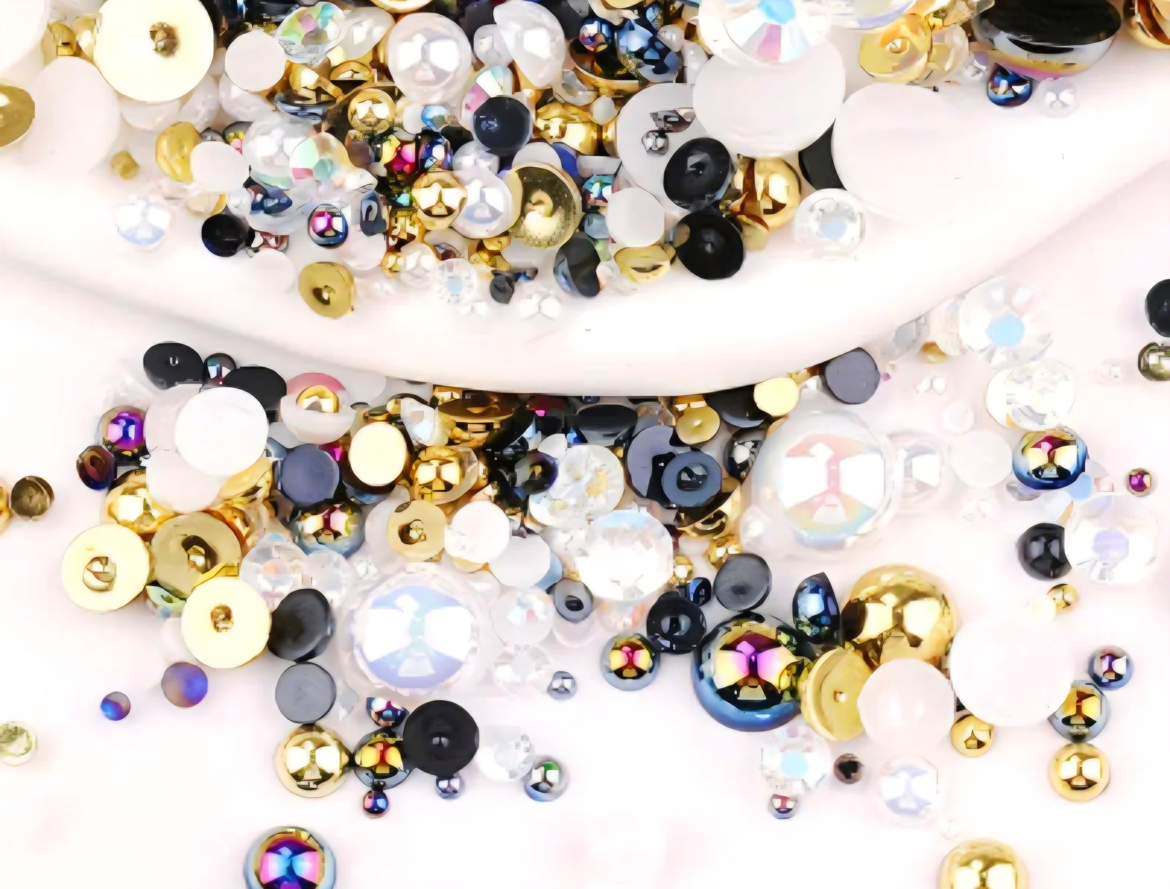 Assorted flatback pearls and rhinestones in black, gold and white
