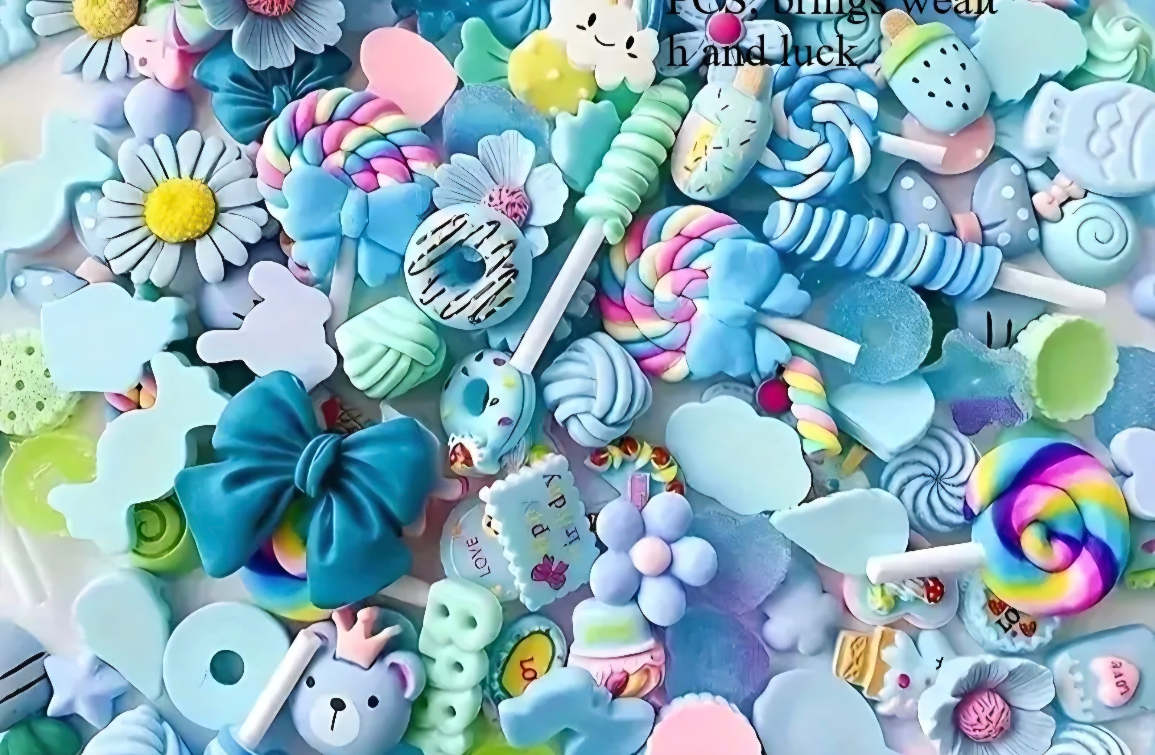 Blue charms in various designs for crafts