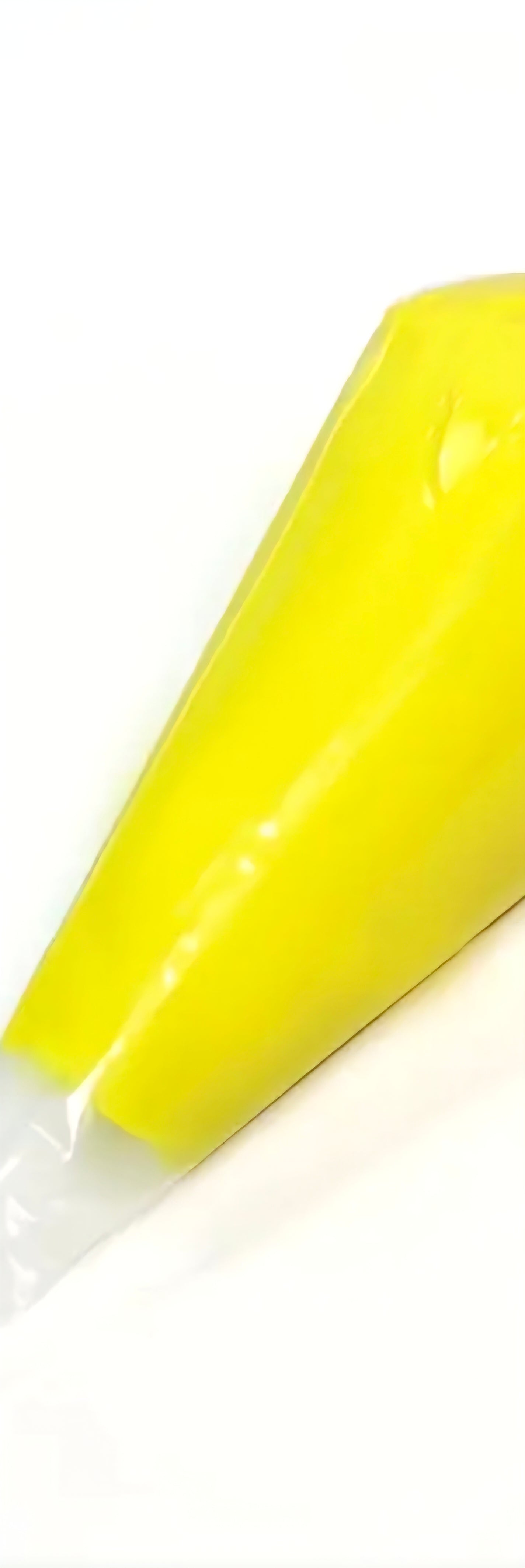 Yellow decoden cream glue tube on a white background