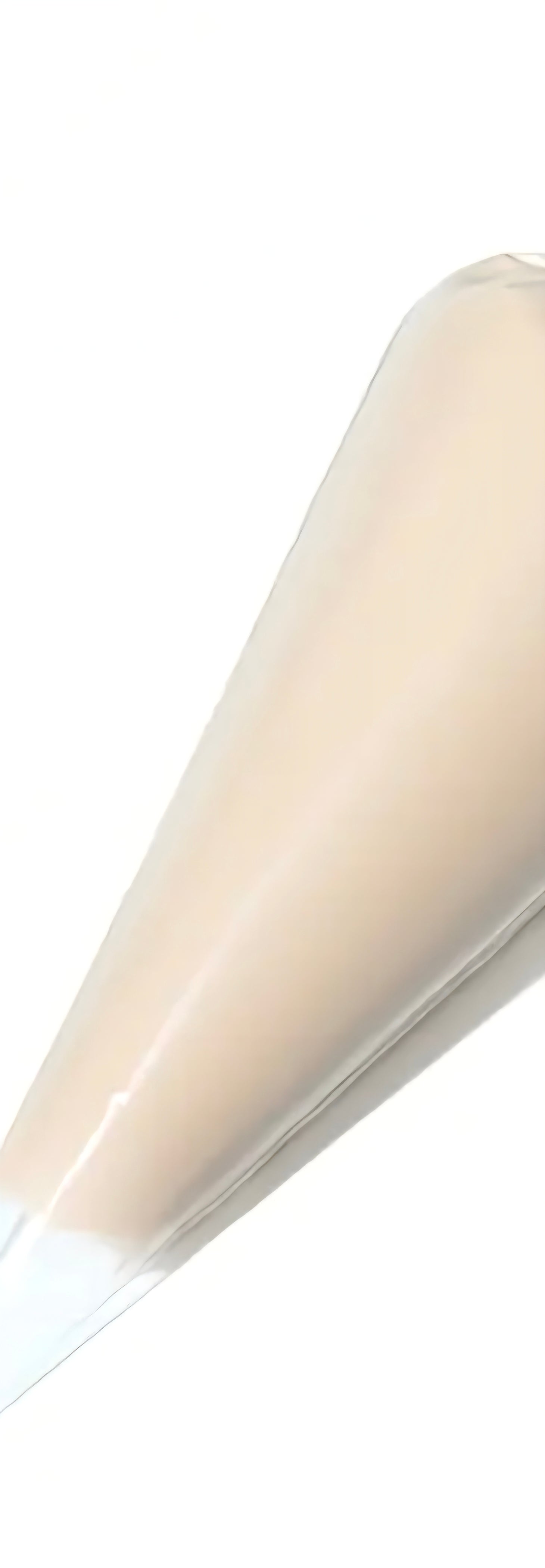 Light beige cream glue on a white background