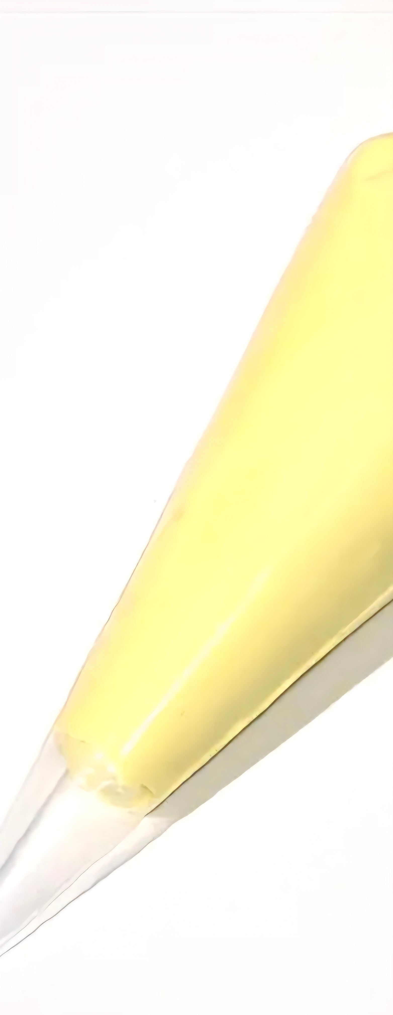 Light Yellow decoden cream glue tube on  white background
