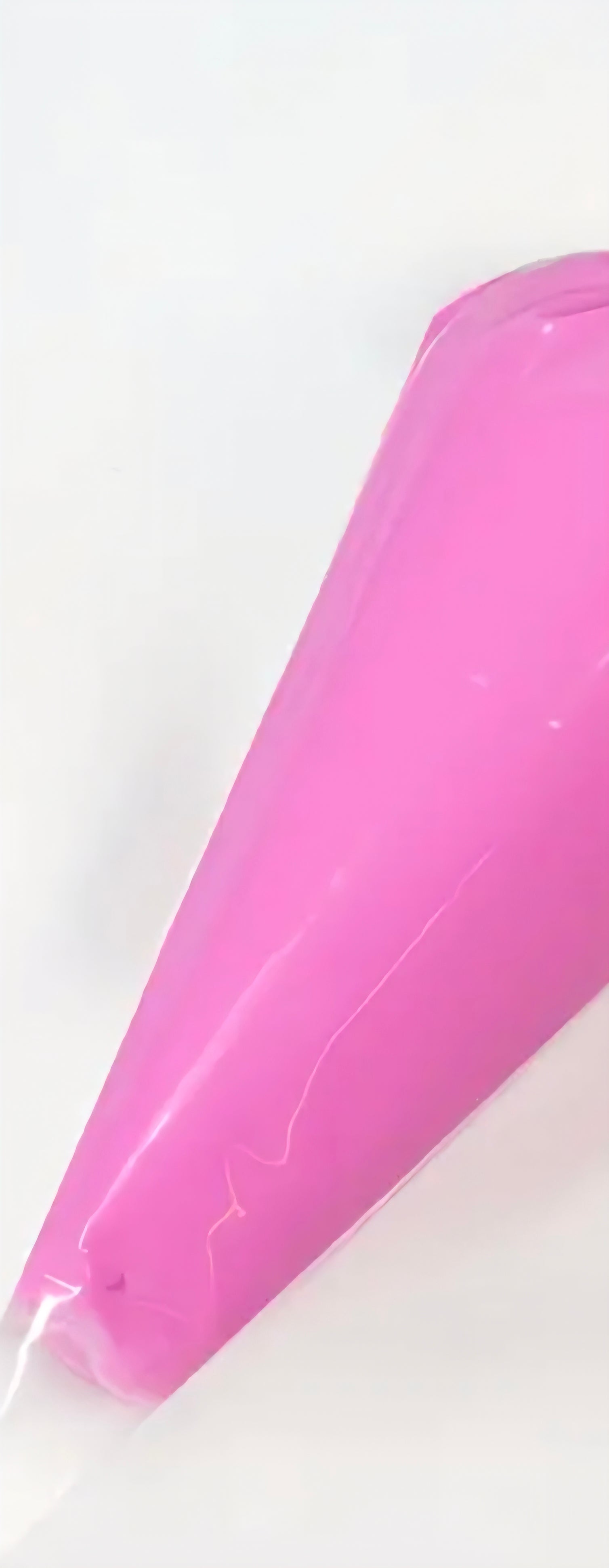 Decoden cream glue tube on white background. 
