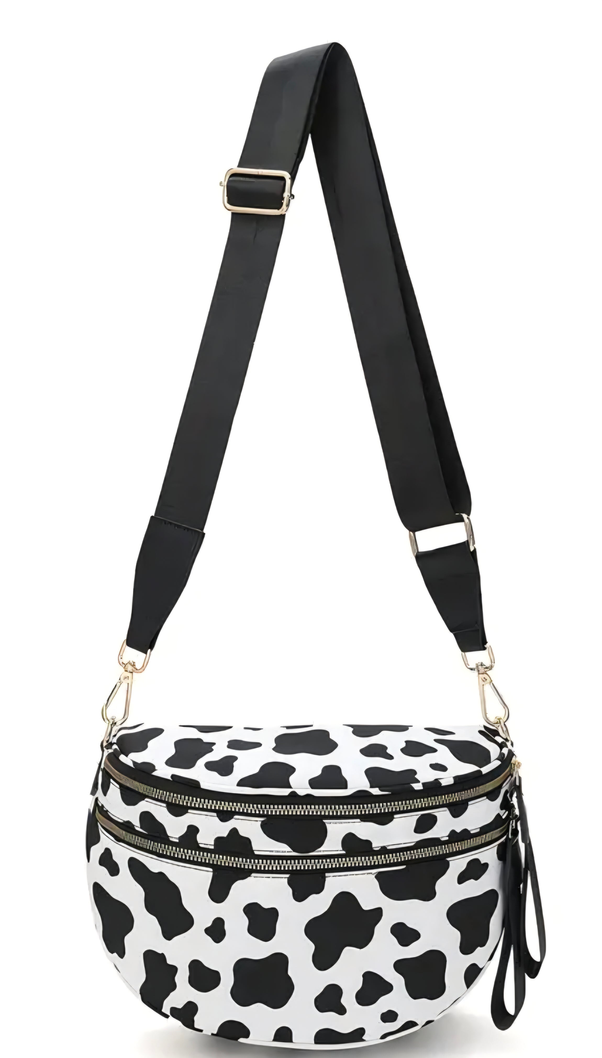Cow print crossbody bag with a black strap on a white background