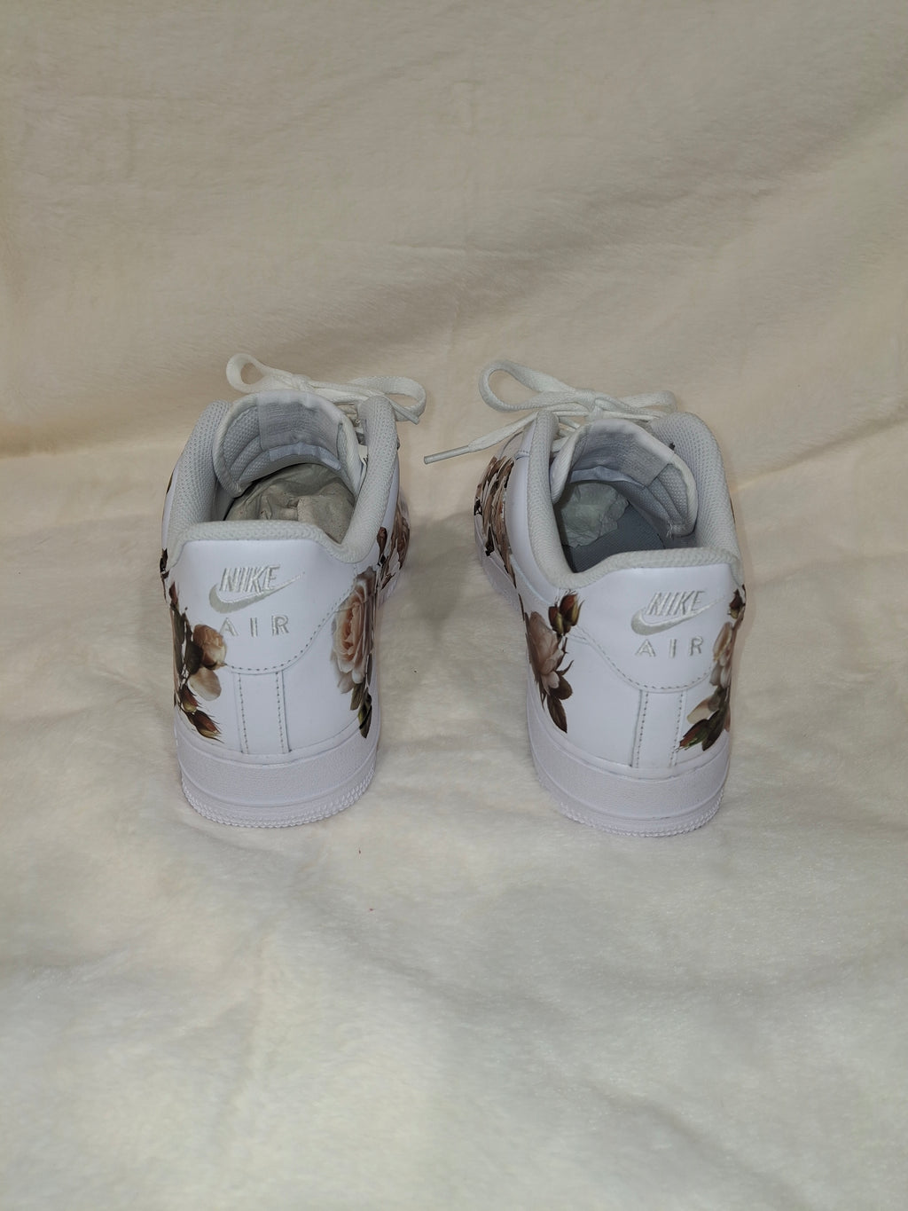 Custom white Air Force One unisex sneakers with floral design by Dressed and Done