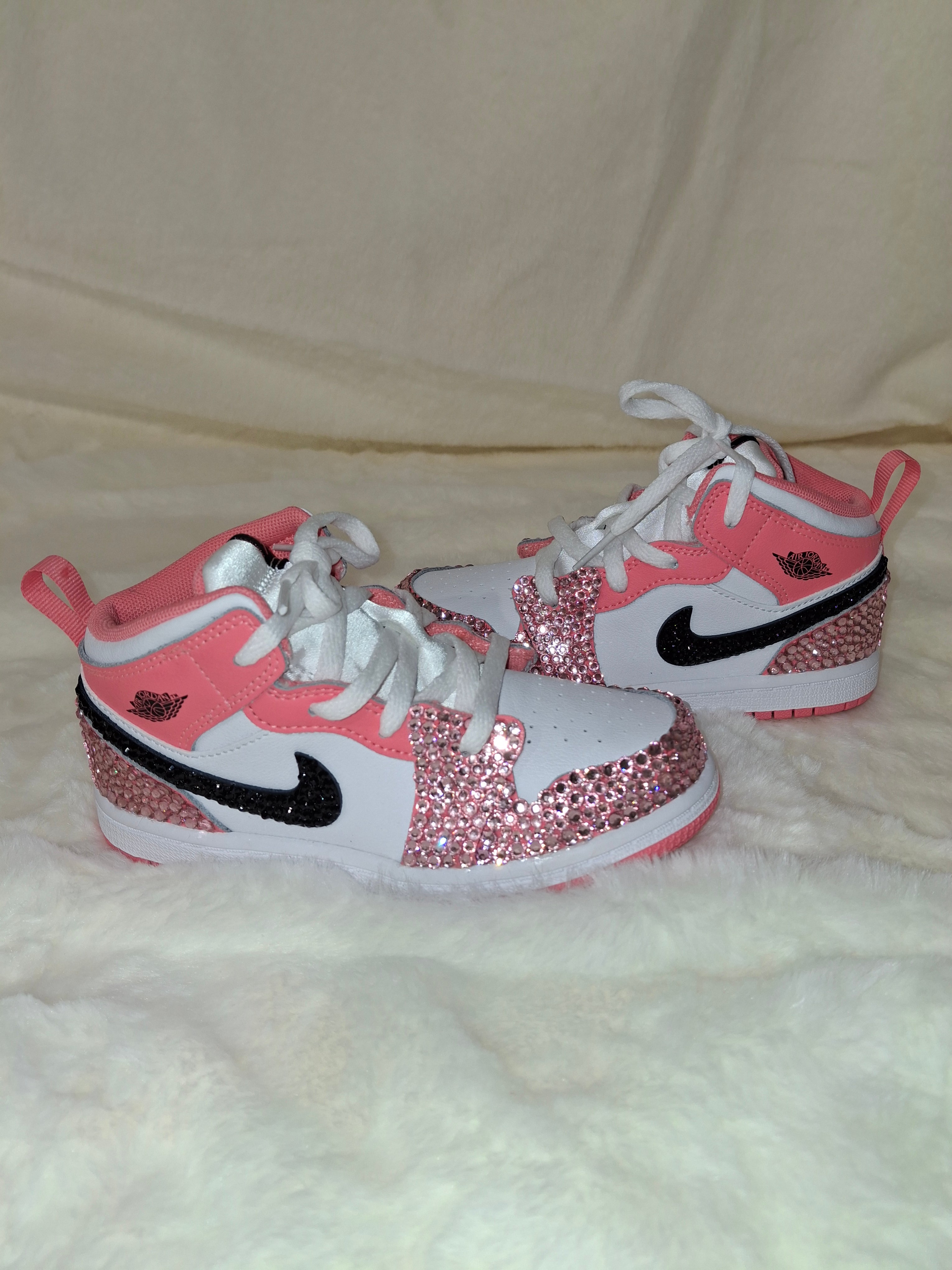 Custom pink and white rhinestone Air Jordan Mid 1 Kids sneakers by Dressed and Done