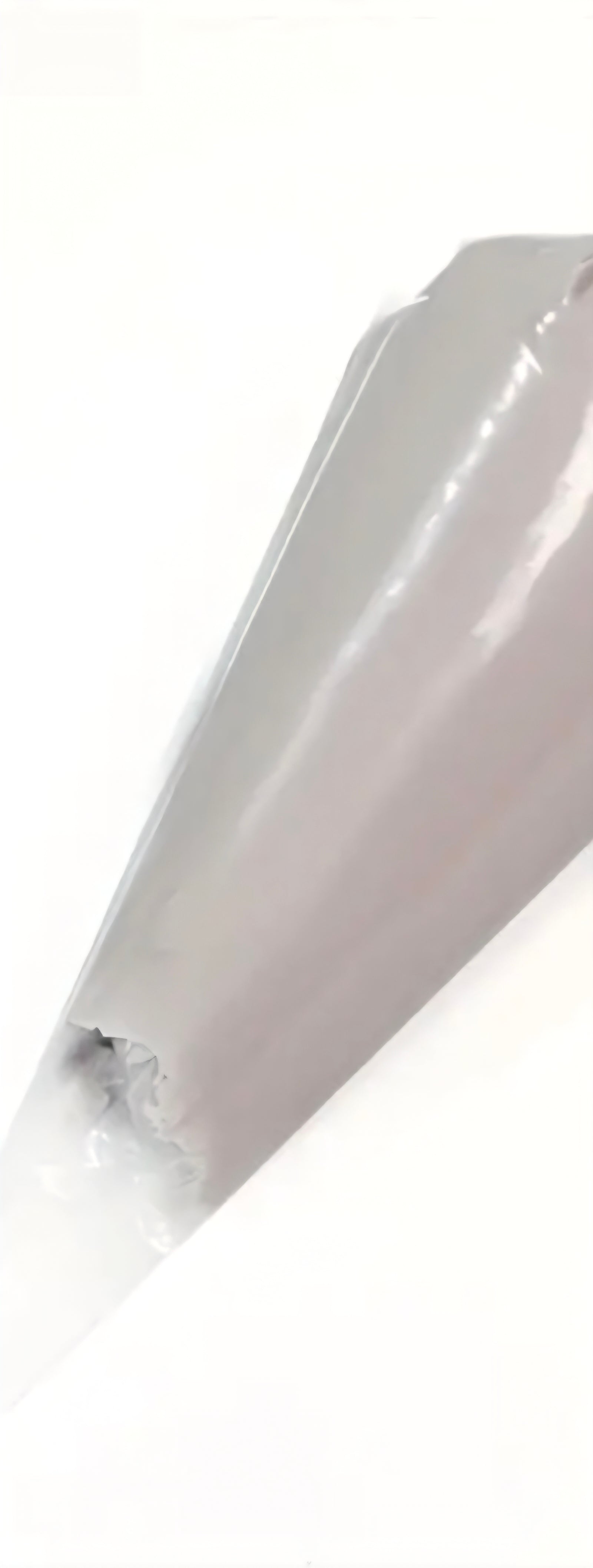 Gray decoden cream glue tube on a white background.