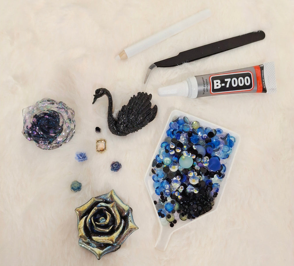 Midnight Glazier junk case kit with black swan charm, rose, blue rhinestones, and B-7000 glue