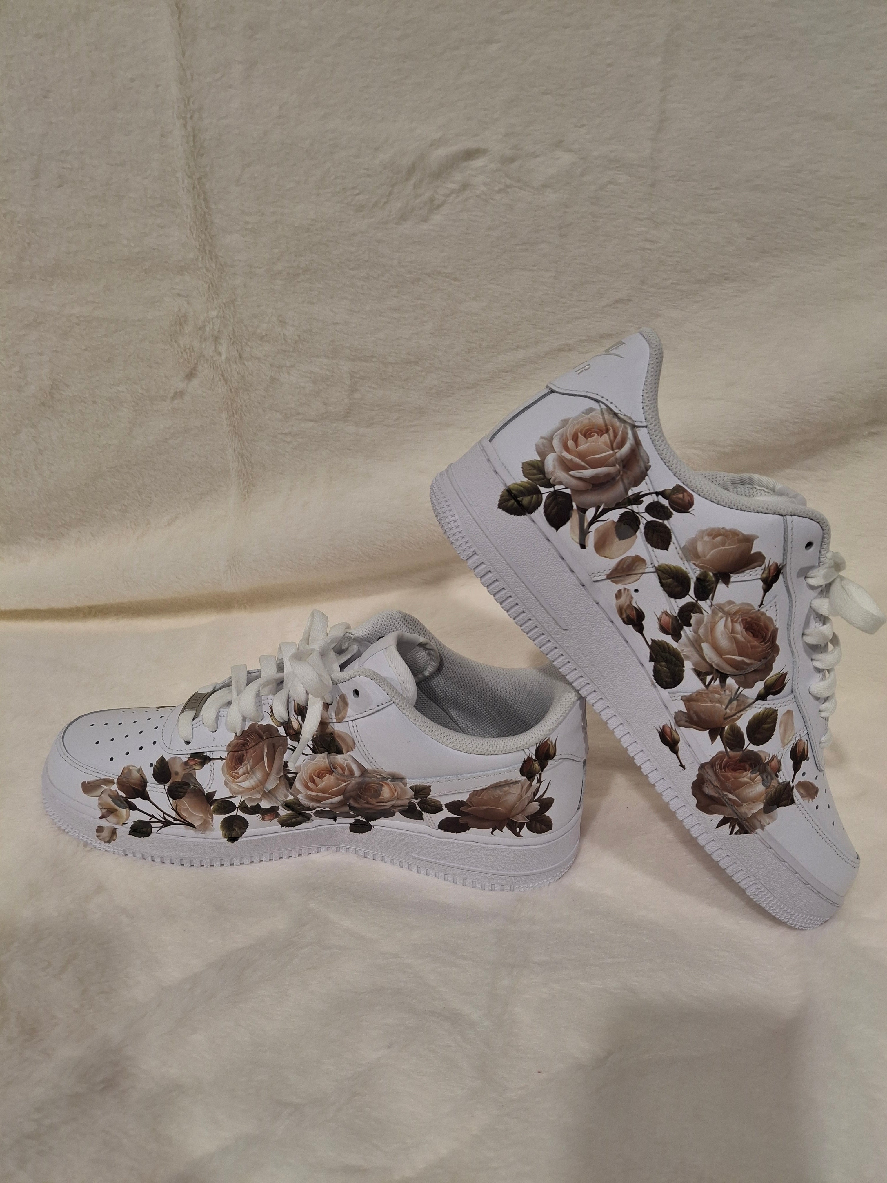 Custom white graphic Air Force One kids sneakers with floral graphic design by Dressed and Done