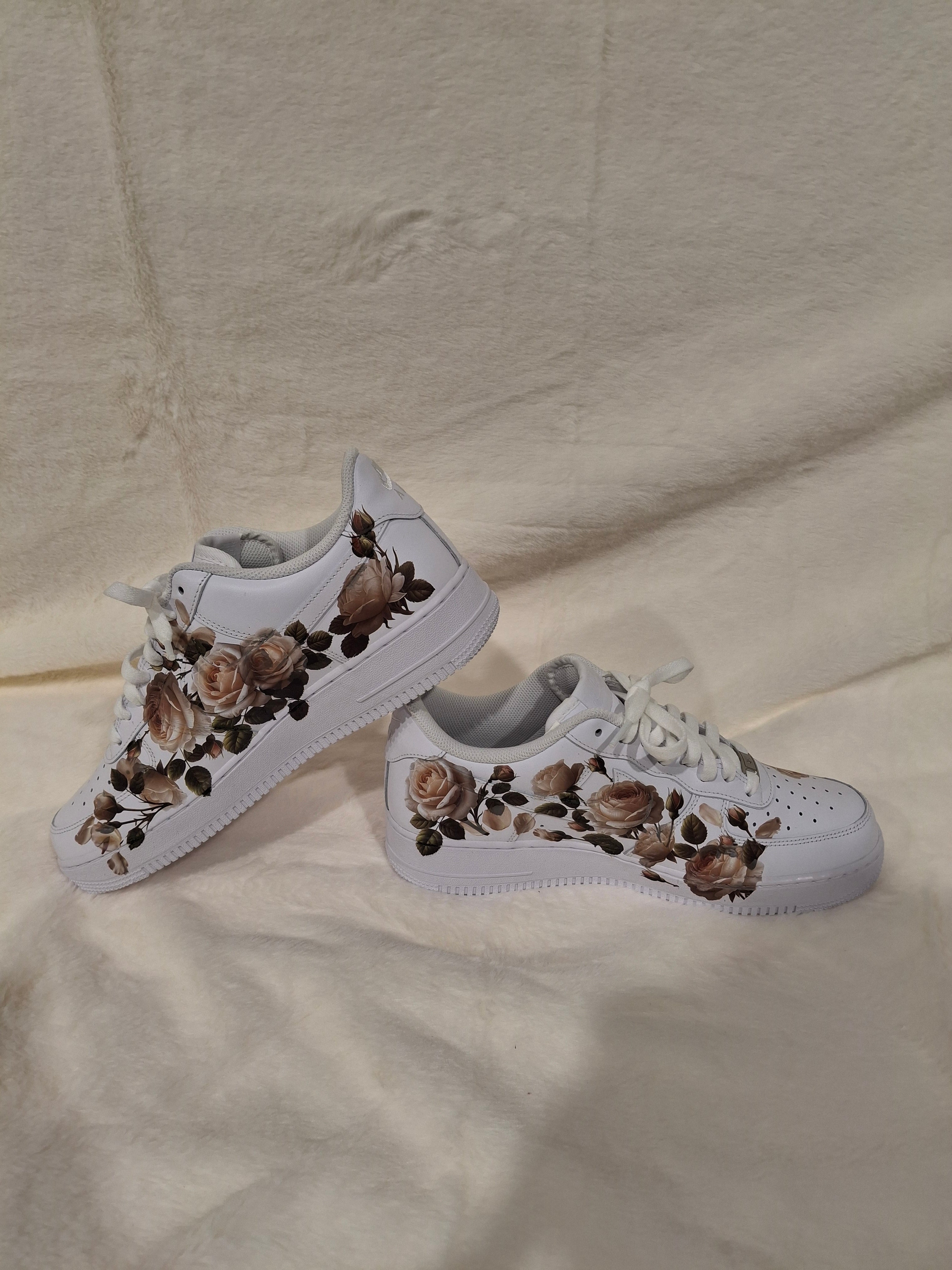 Custom white Air Force One sneakers with handcrafted floral design by Dressed and Done