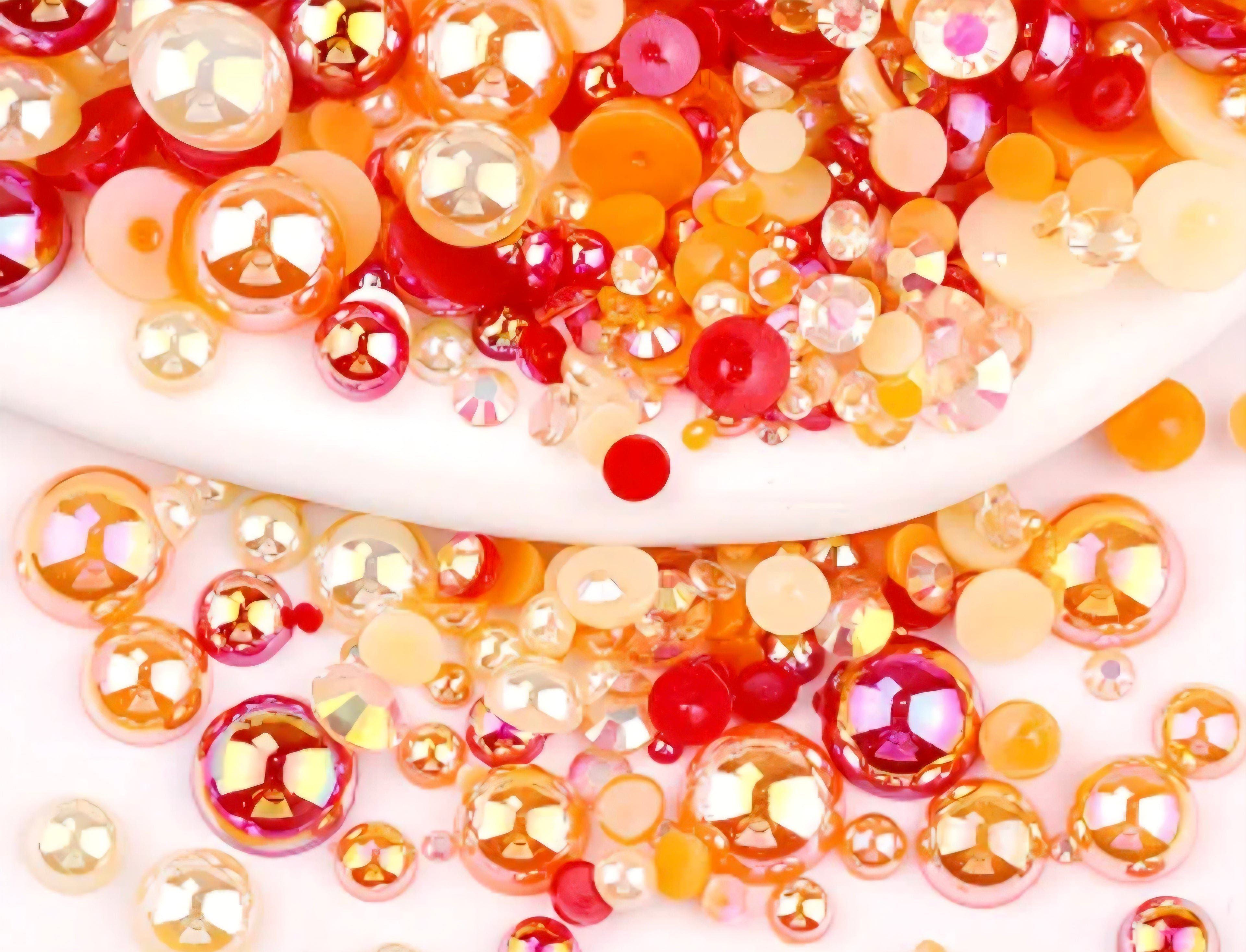 orange and red rhinestones and flat back pearls 