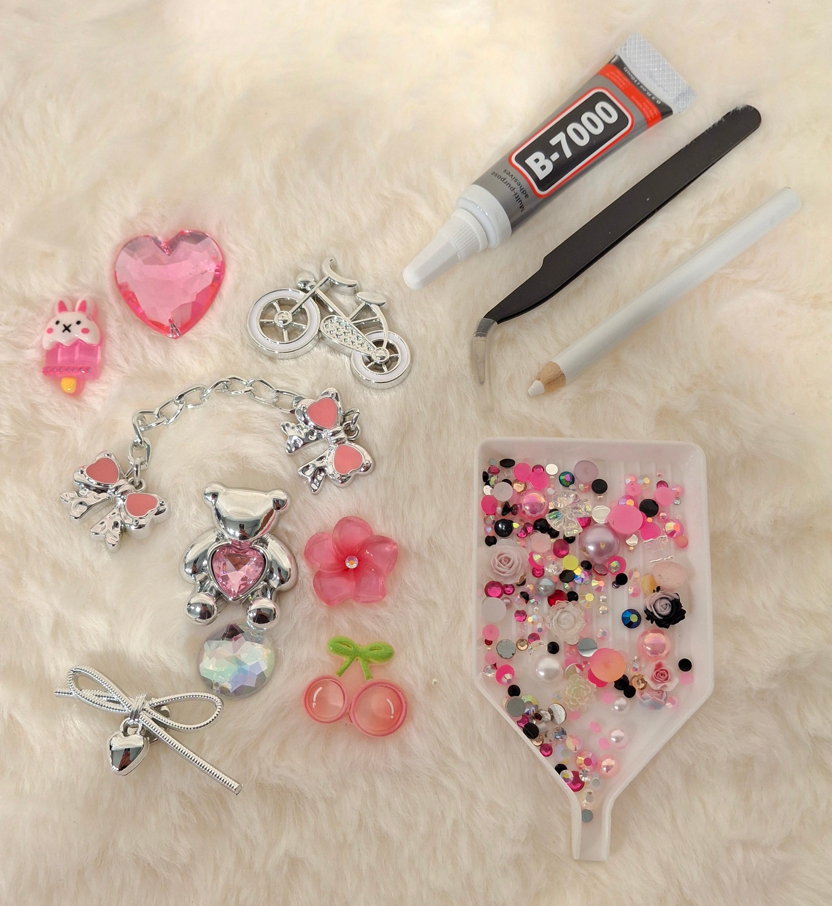 Pink Paradise Silver junk case kit contents including rhinestones, pearls, and flatback charms