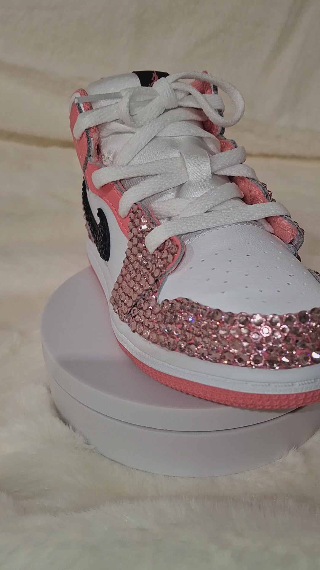 Custom pair of Air Jordan Mid 1 sneakers