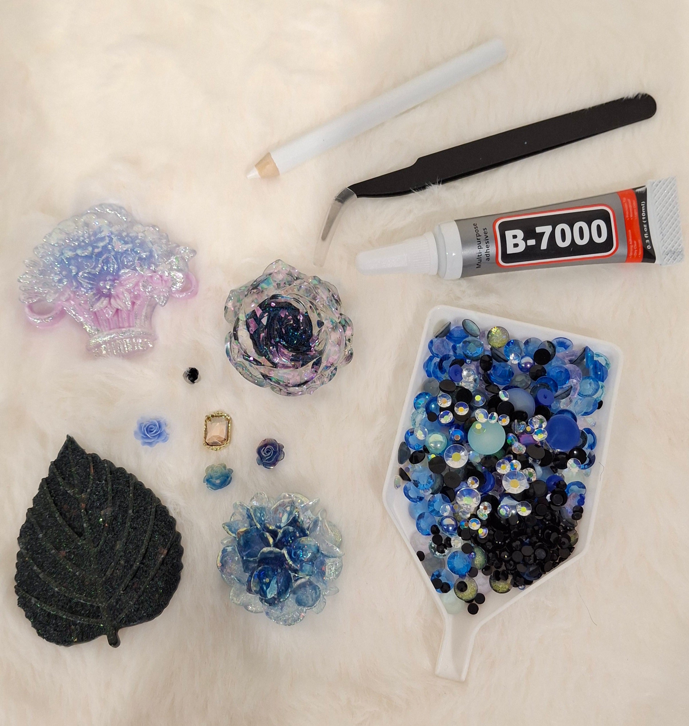 Purple, blue, and black flatback rhinestones and craft charms for DIY junk phone cases