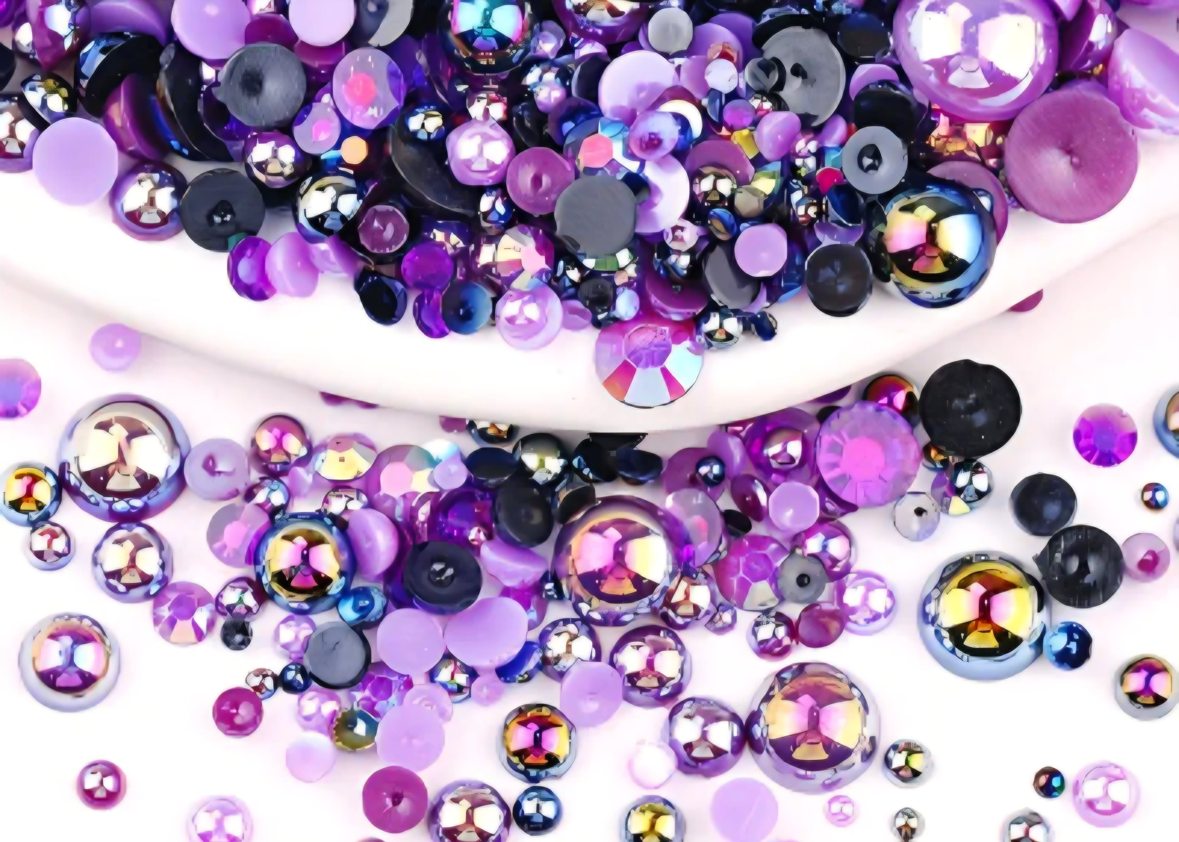 Purple pearls and rhinestones for crafts