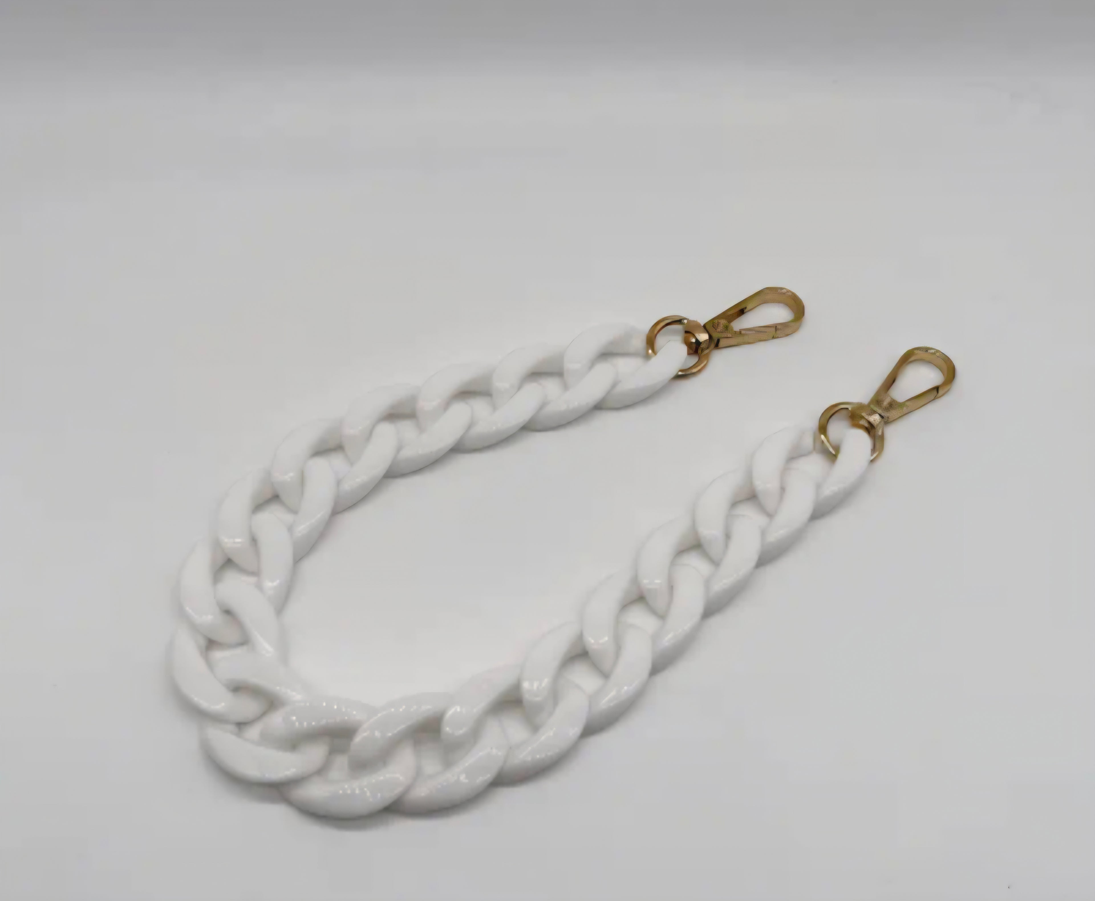 White acrylic purse chain on white background