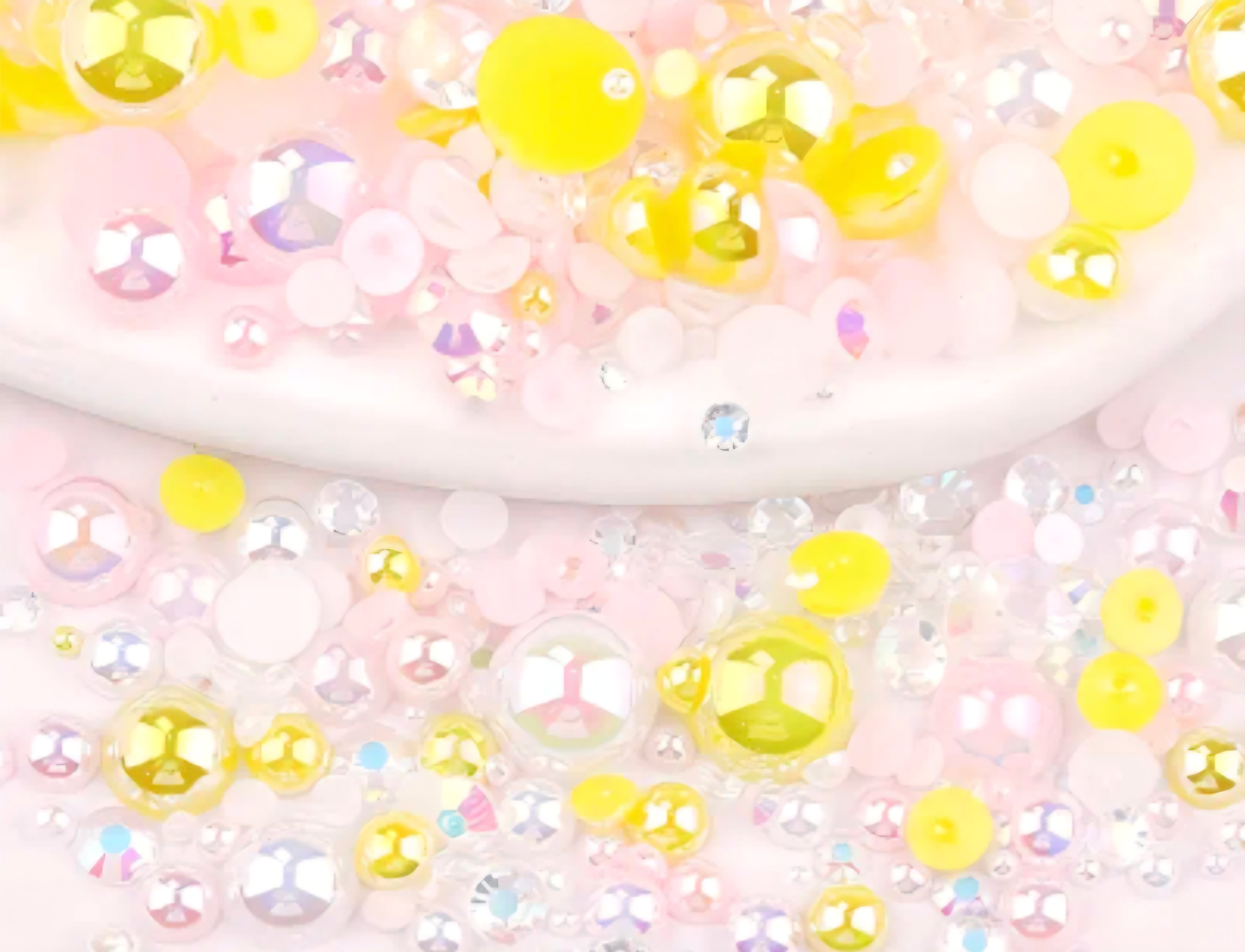 yellow, pink and white pearls and rhinestones for diy crafts